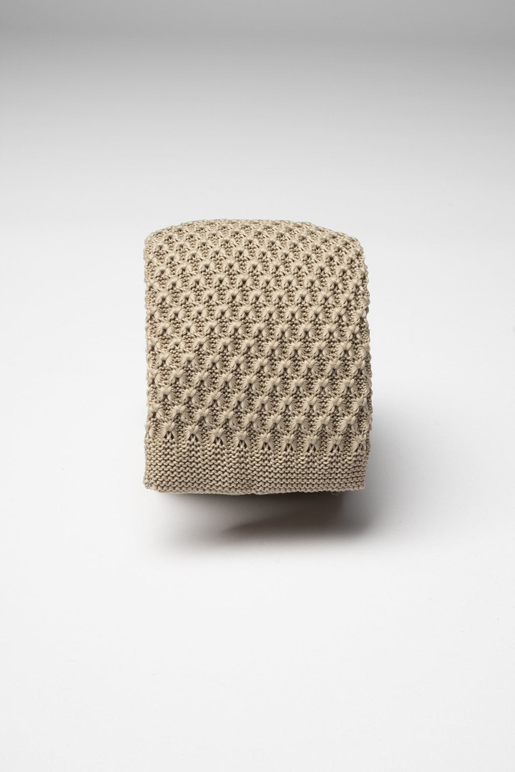 beige knitted tie